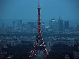 Paris 07 Lights On Eiffel Tower Just After Sunset With La Defense Behind From Montparnasse Tower